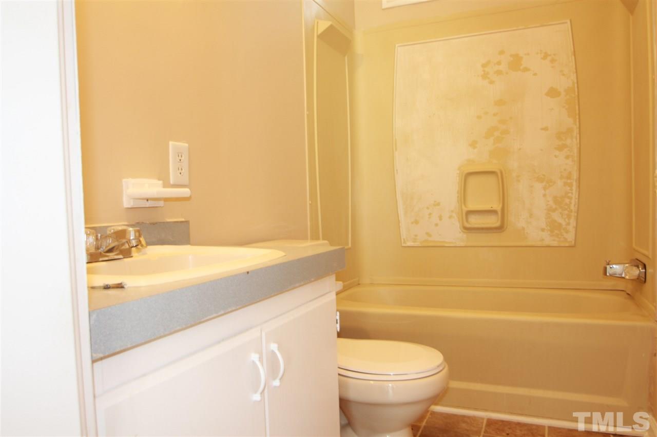 407 Line Road Cameron, NC 28326 - Photo 13 of 13 a bathroom with a sink a toilet and shower