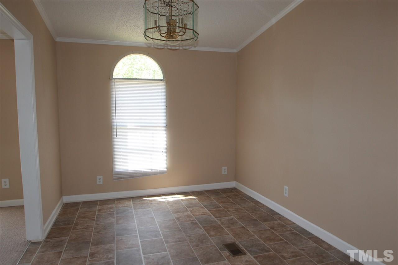 407 Line Road Cameron, NC 28326 - Photo 6 of 13 an empty room with a window