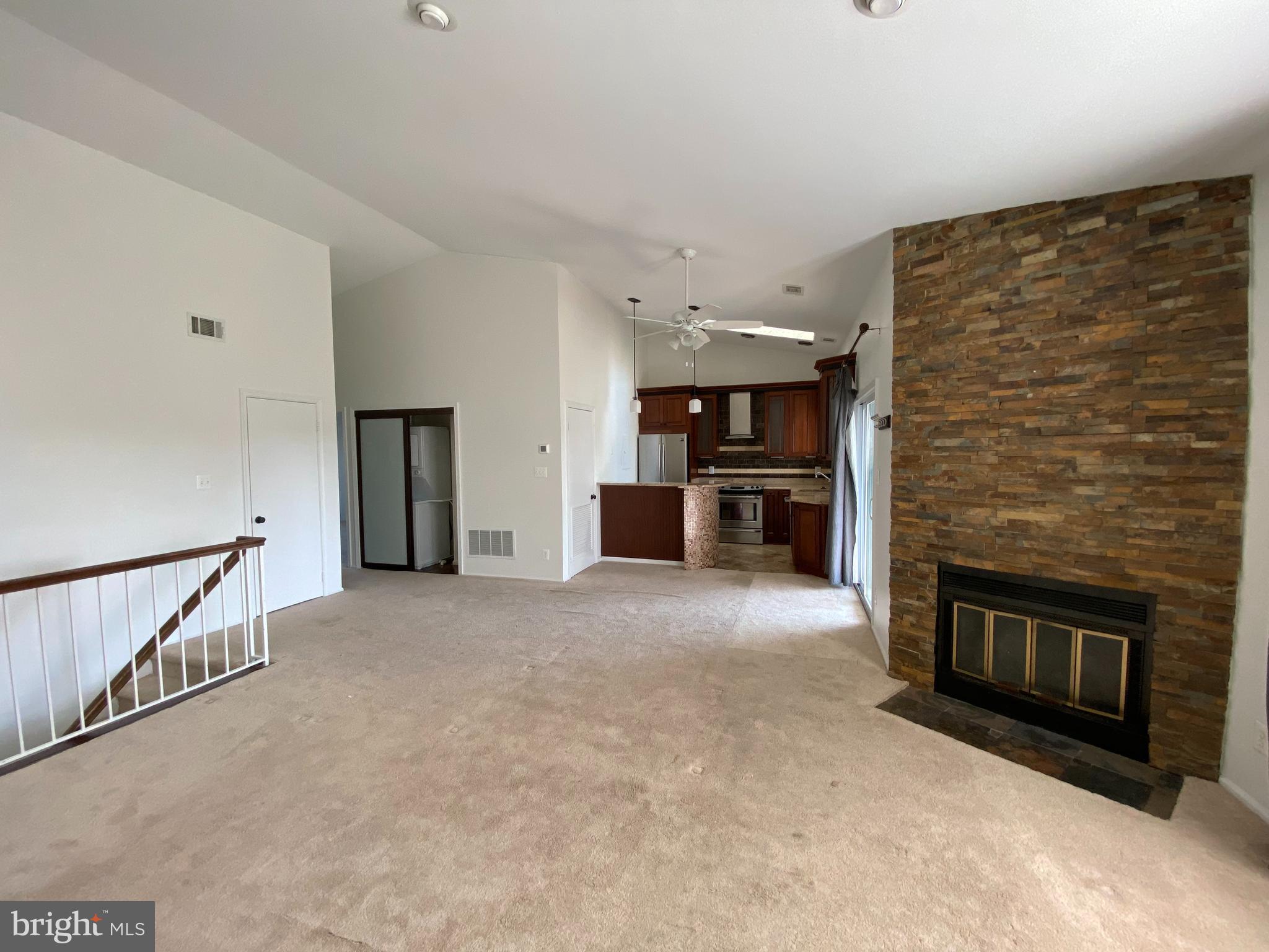 12944 Grays Pointe Road, Unit 12944C Fairfax, VA 22033 - Photo 8 of 16 a view of a livingroom with a fireplace