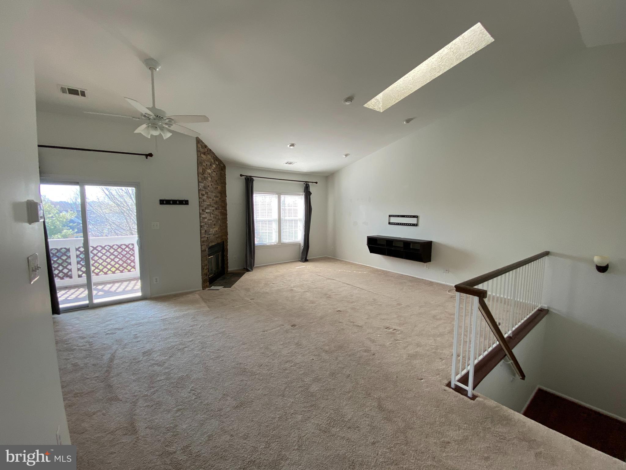 12944 Grays Pointe Road, Unit 12944C Fairfax, VA 22033 - Photo 9 of 16 a bedroom with furniture and windows