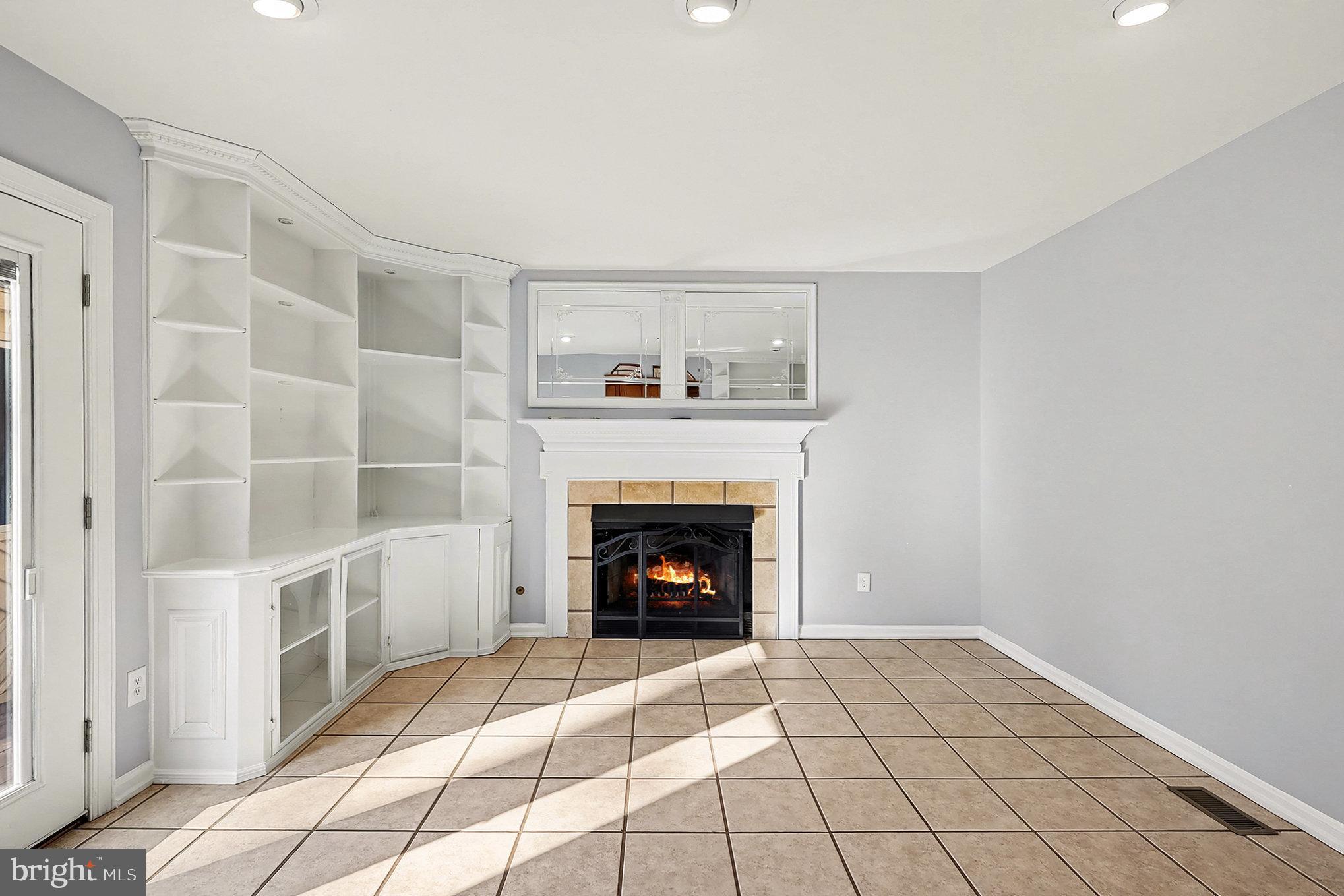 5819 Stone Ridge Drive Centreville, VA 20120 - Photo 15 of 41 Built-ins and a fireplace.
