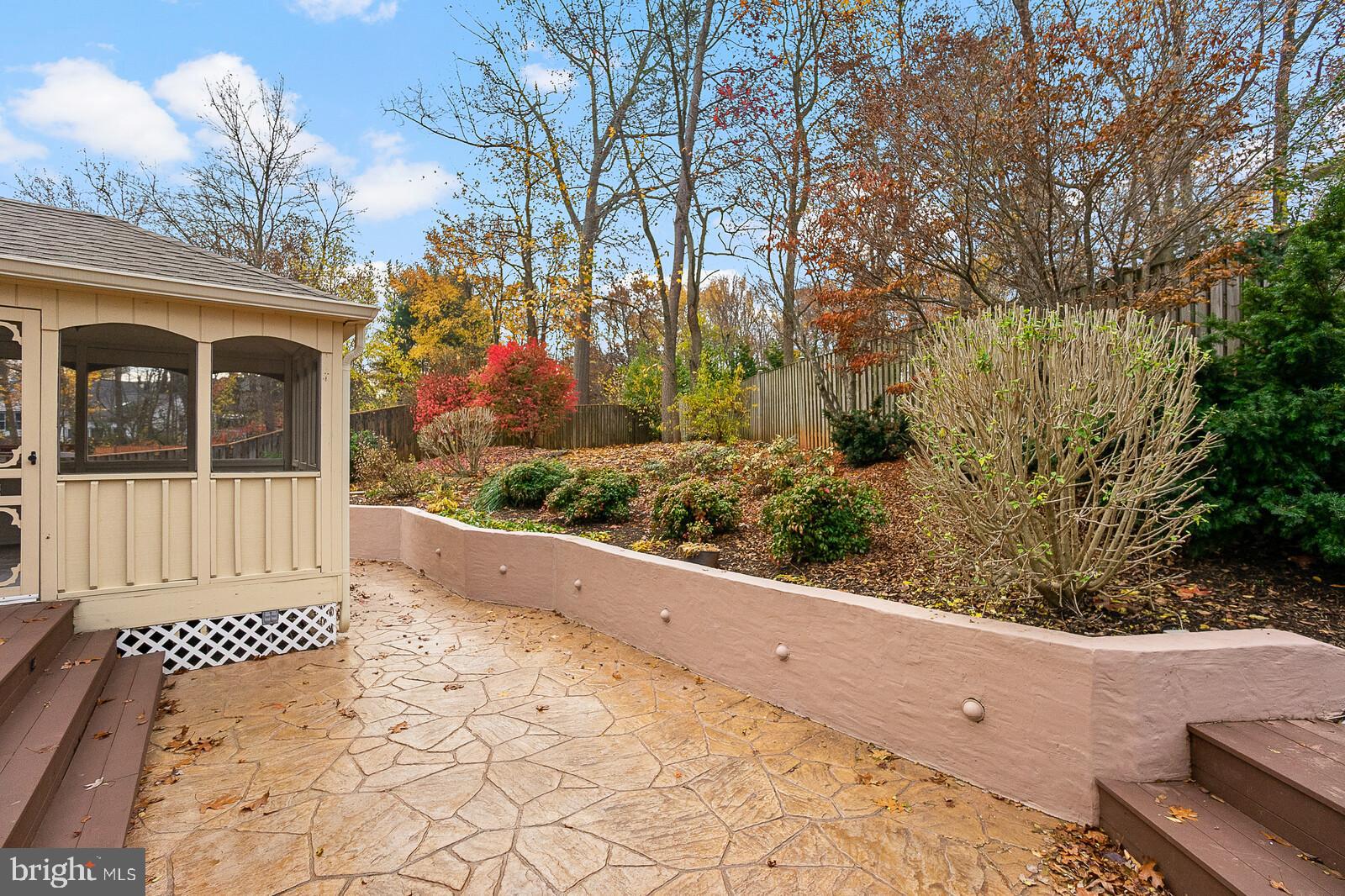 5819 Stone Ridge Drive Centreville, VA 20120 - Photo 22 of 24 Extensive hardscaped back patio WITH gazebo.