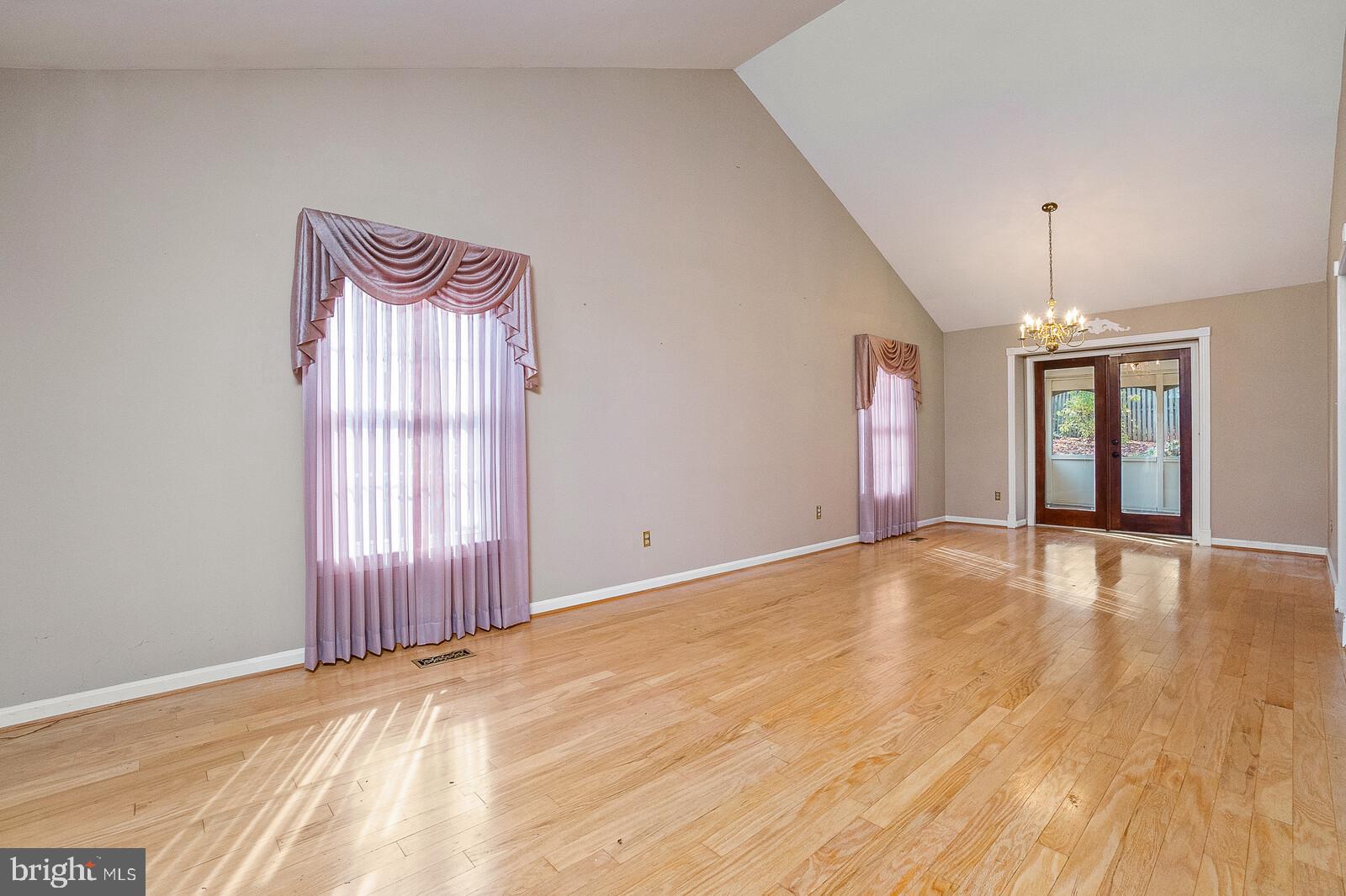5819 Stone Ridge Drive Centreville, VA 20120 - Photo 5 of 24 Formal dining room leads to screened in porch.