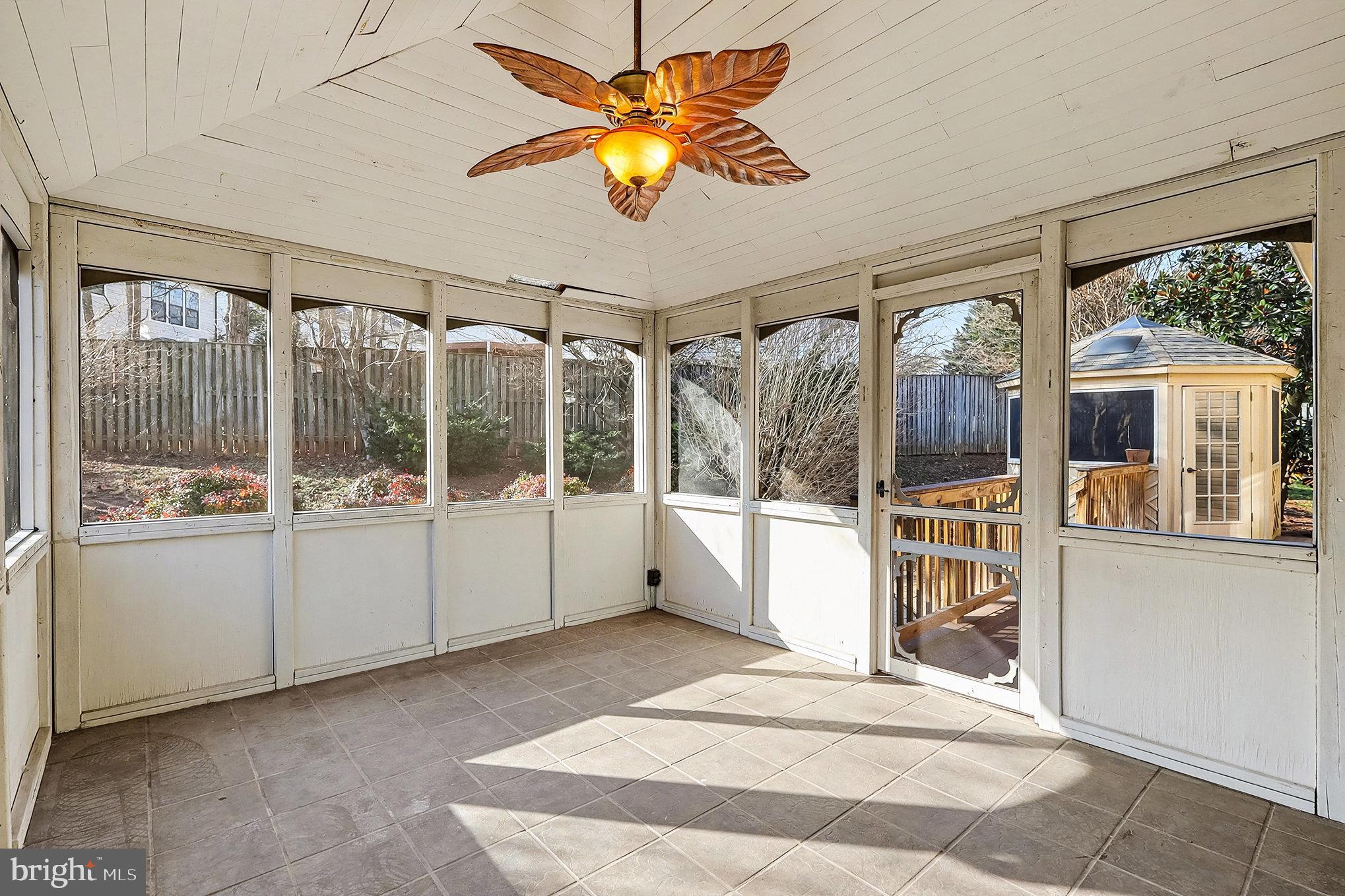5819 Stone Ridge Drive Centreville, VA 20120 - Photo 9 of 41 Screened in porch off dining room.