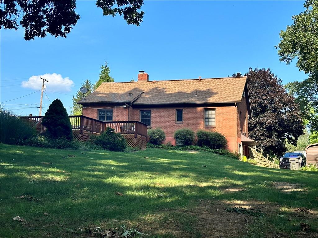 211 Country Club Road Butler, PA 16002 - Photo 3 of 25 a view of a house with a backyard