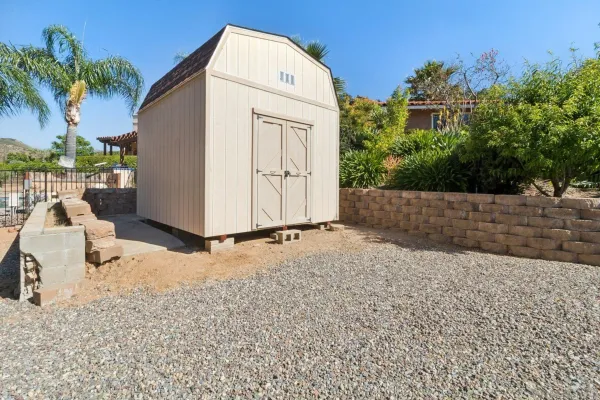 a view of backyard of house