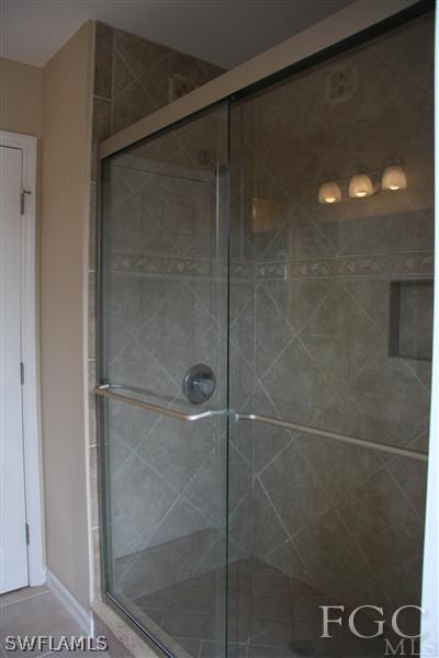 8374 Robin Road Fort Myers, FL 33967 - Photo 6 of 7 a bathroom with a shower
