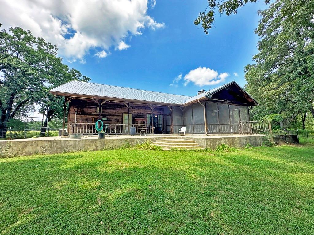 10466 Fm 3273 Athens, TX 75751 - Photo 11 of 24 a view of a house with a swimming pool and sitting area