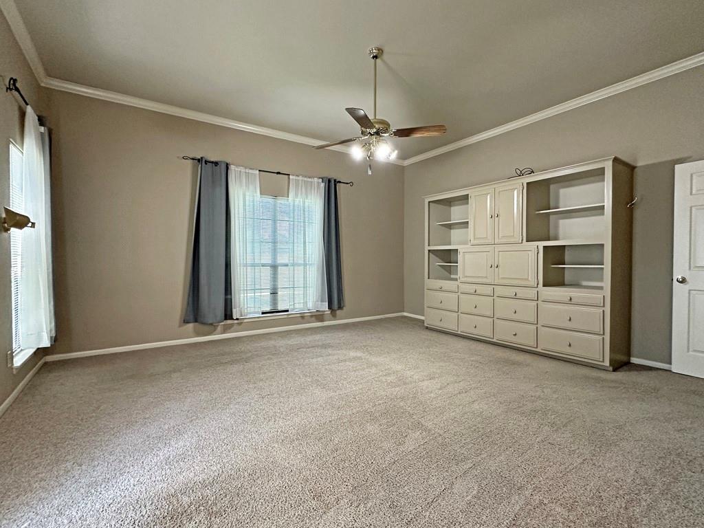 10466 Fm 3273 Athens, TX 75751 - Photo 5 of 24 a view of an empty room with cabinet and a window