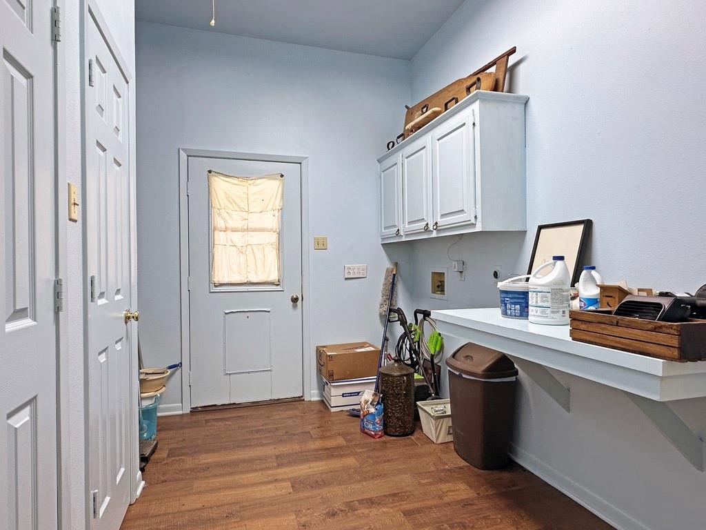 10466 Fm 3273 Athens, TX 75751 - Photo 9 of 24 a view of a workspace with furniture and wooden floor