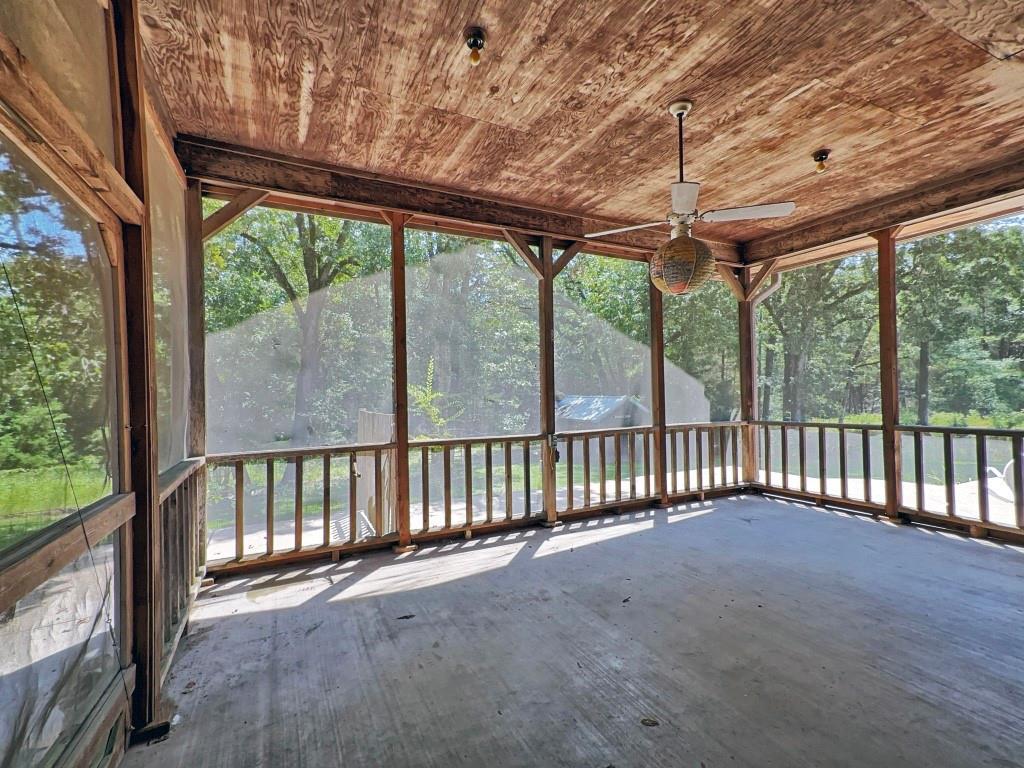 10466 Fm 3273 Athens, TX 75751 - Photo 10 of 24 a view of a porch with wooden floor of the house