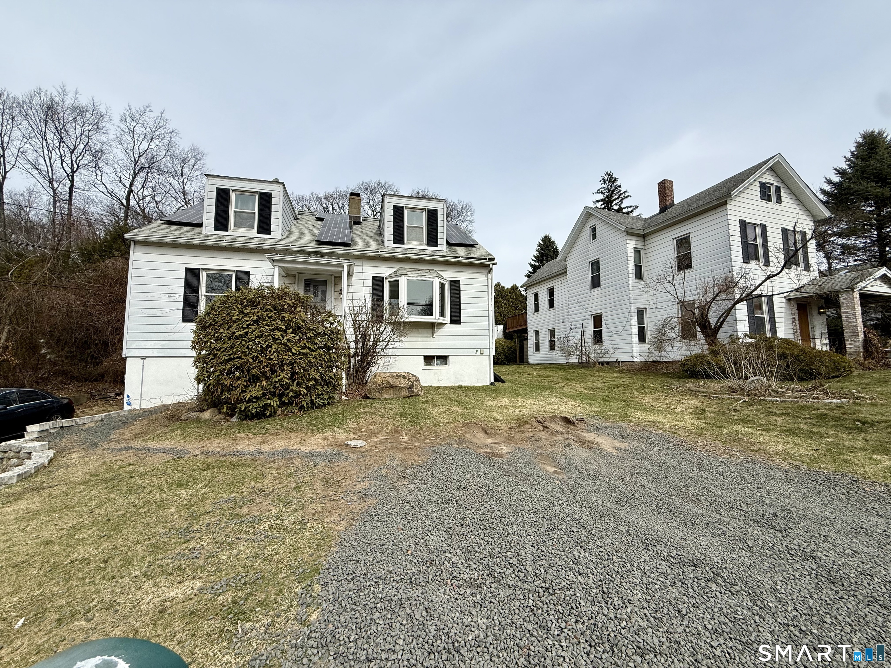 37 Alexander Avenue, Unit 1 Waterbury, CT 06705 - Photo 14 of 14 a front view of a house with a yard