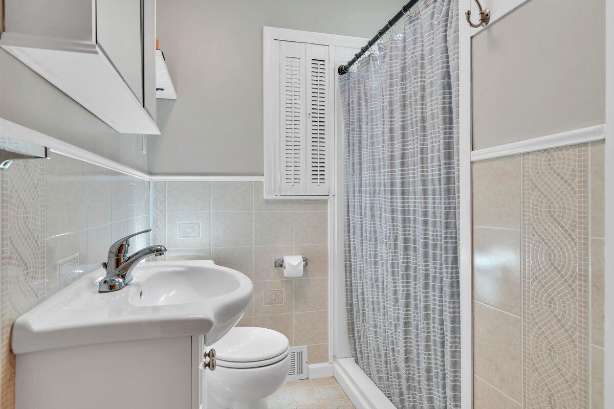3226 Rakes Road Rocky Mount, VA 24151 - Photo 39 of 74 a bathroom with a sink toilet and shower
