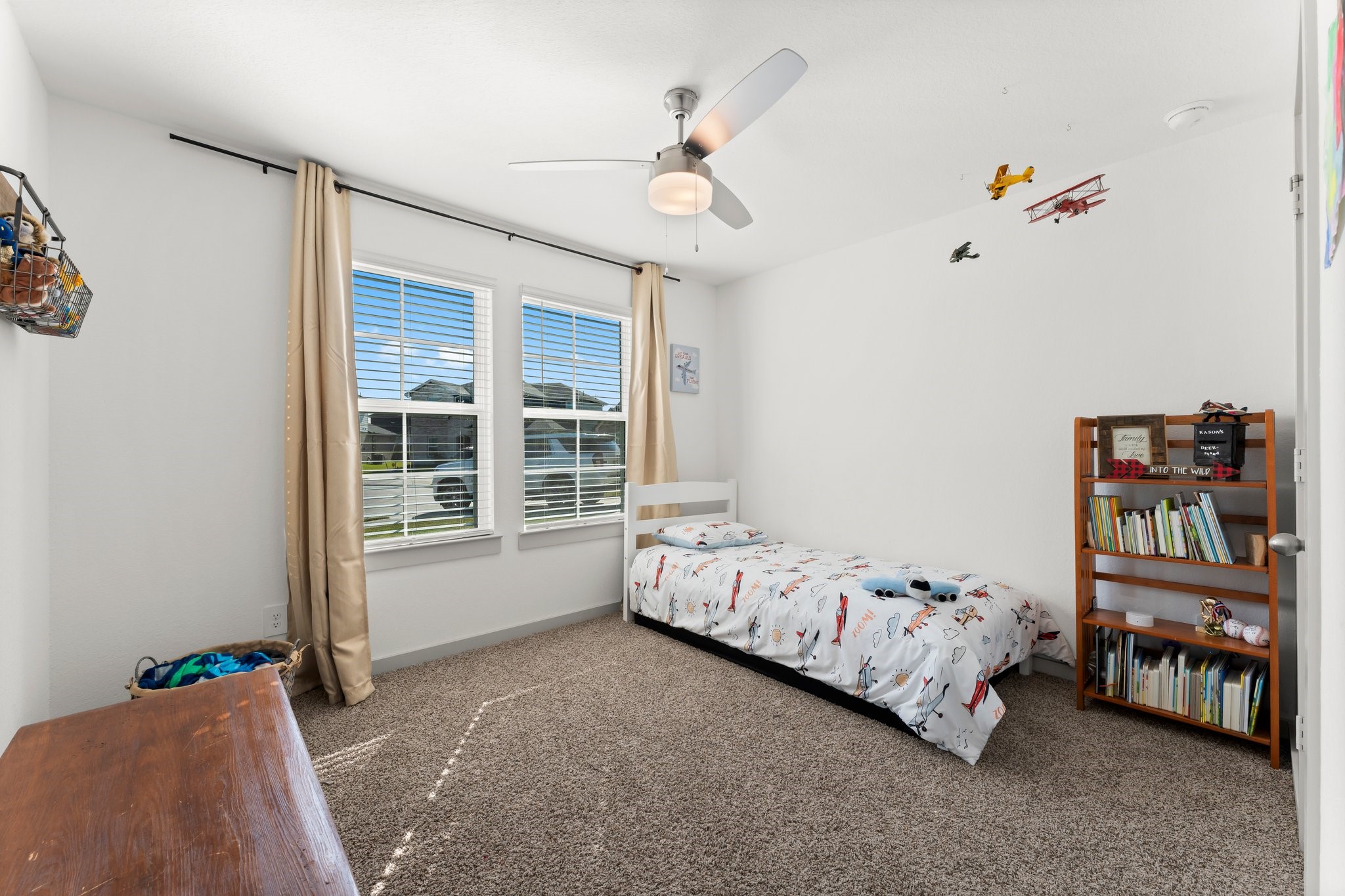 1007 Cotswold Court Rosharon, TX 77583 - Photo 18 of 30 a bedroom with bed and a chandelier