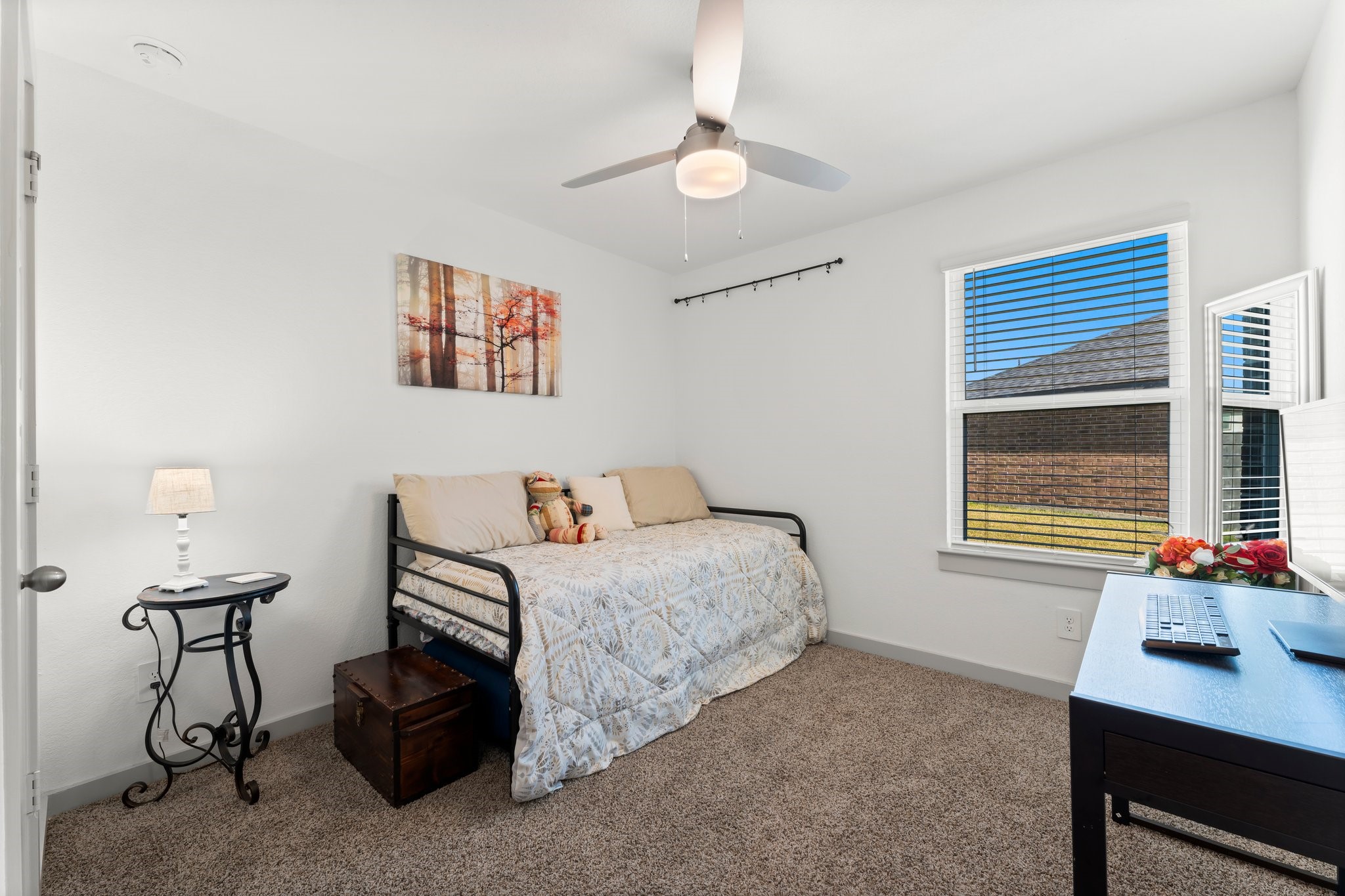 1007 Cotswold Court Rosharon, TX 77583 - Photo 22 of 30 a bedroom with a bed and a table