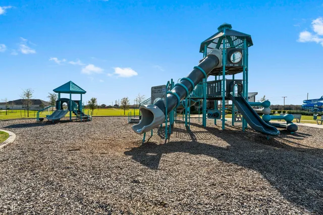 a view of a park with slide