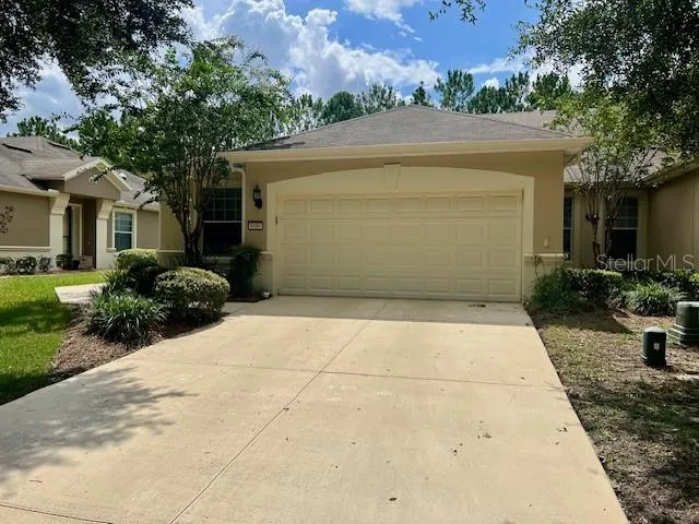 front view of house along with trees