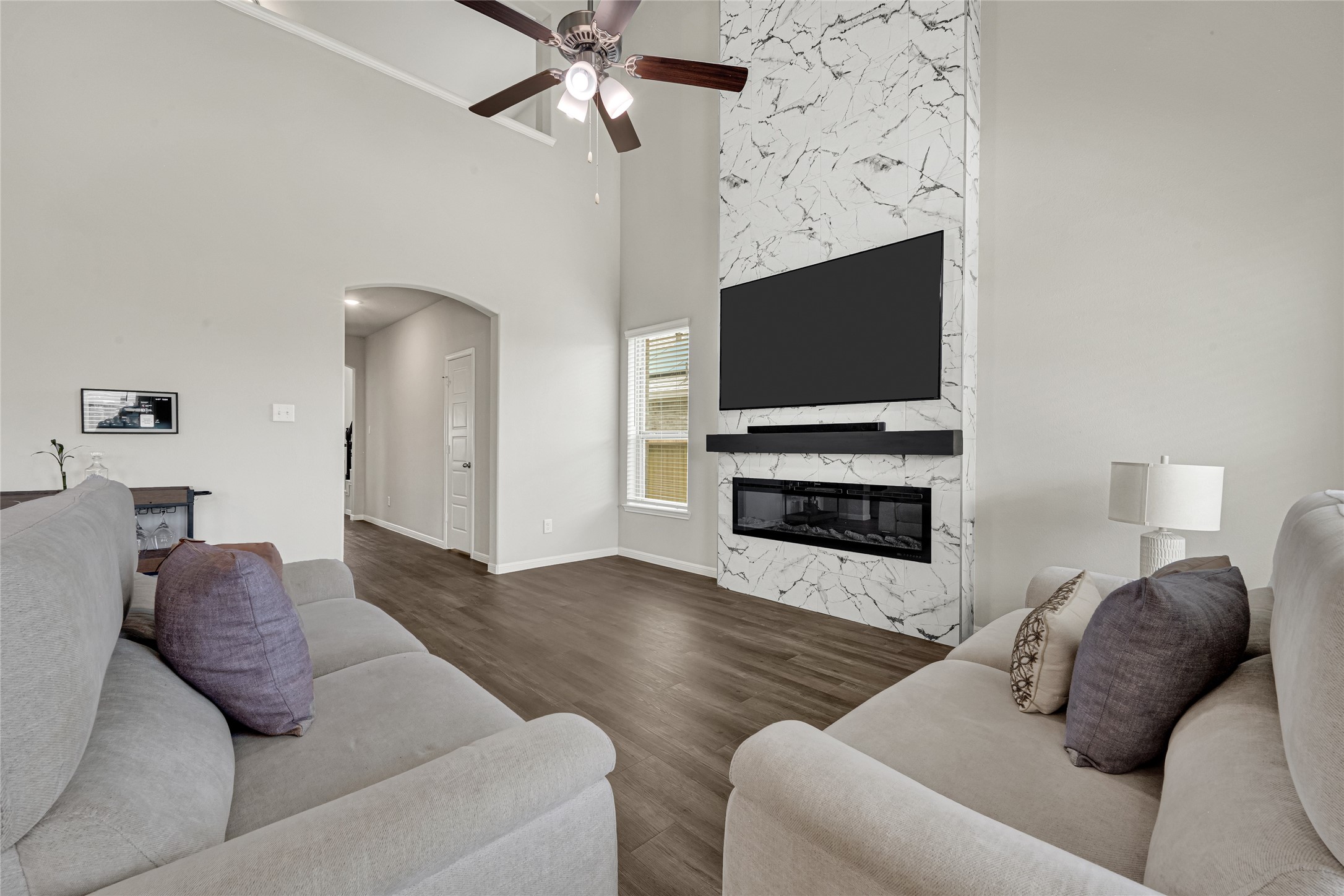 4206 Fenwick Road Texas City, TX 77591 - Photo 9 of 26 The living area has plenty of natural light and a loft above that overlooks this beautiful space.