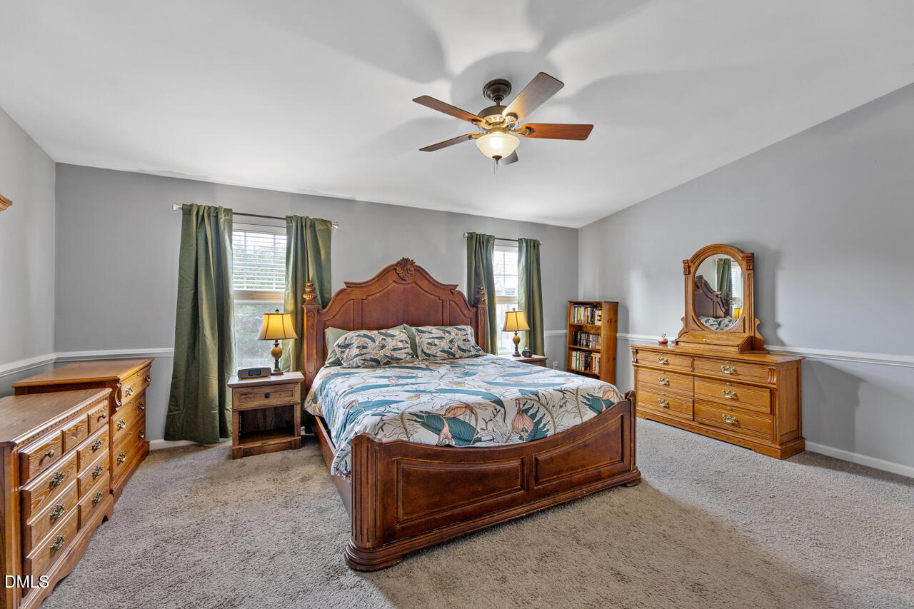 401 Scripps Lane, Unit 104 Raleigh, NC 27610 - Photo 5 of 25 Primary Bedroom