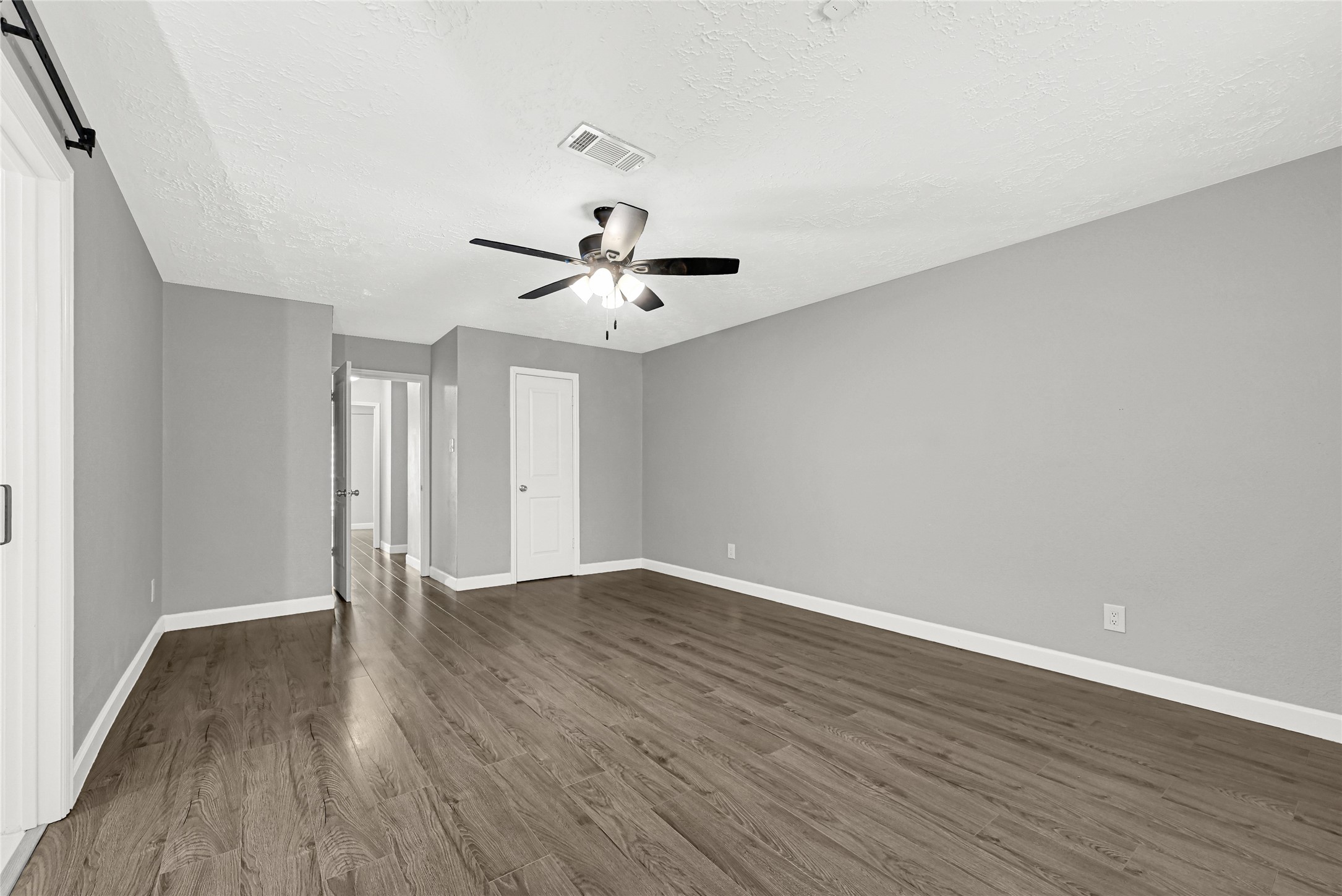 2407 Rambling Brook Drive Spring, TX 77373 - Photo 23 of 49 a view of an empty room with wooden floor