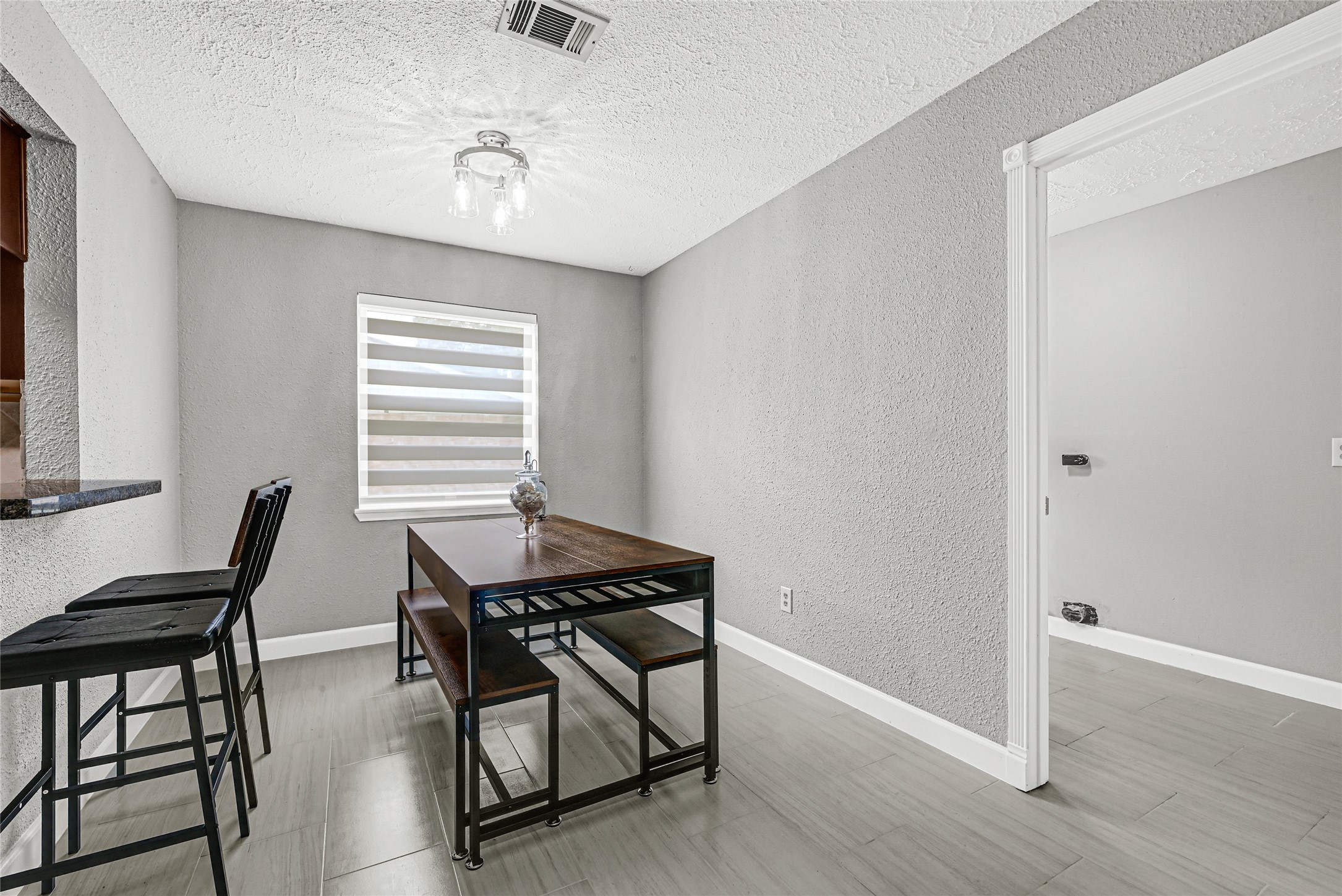 2407 Rambling Brook Drive Spring, TX 77373 - Photo 32 of 49 a view of a workspace with furniture and a window