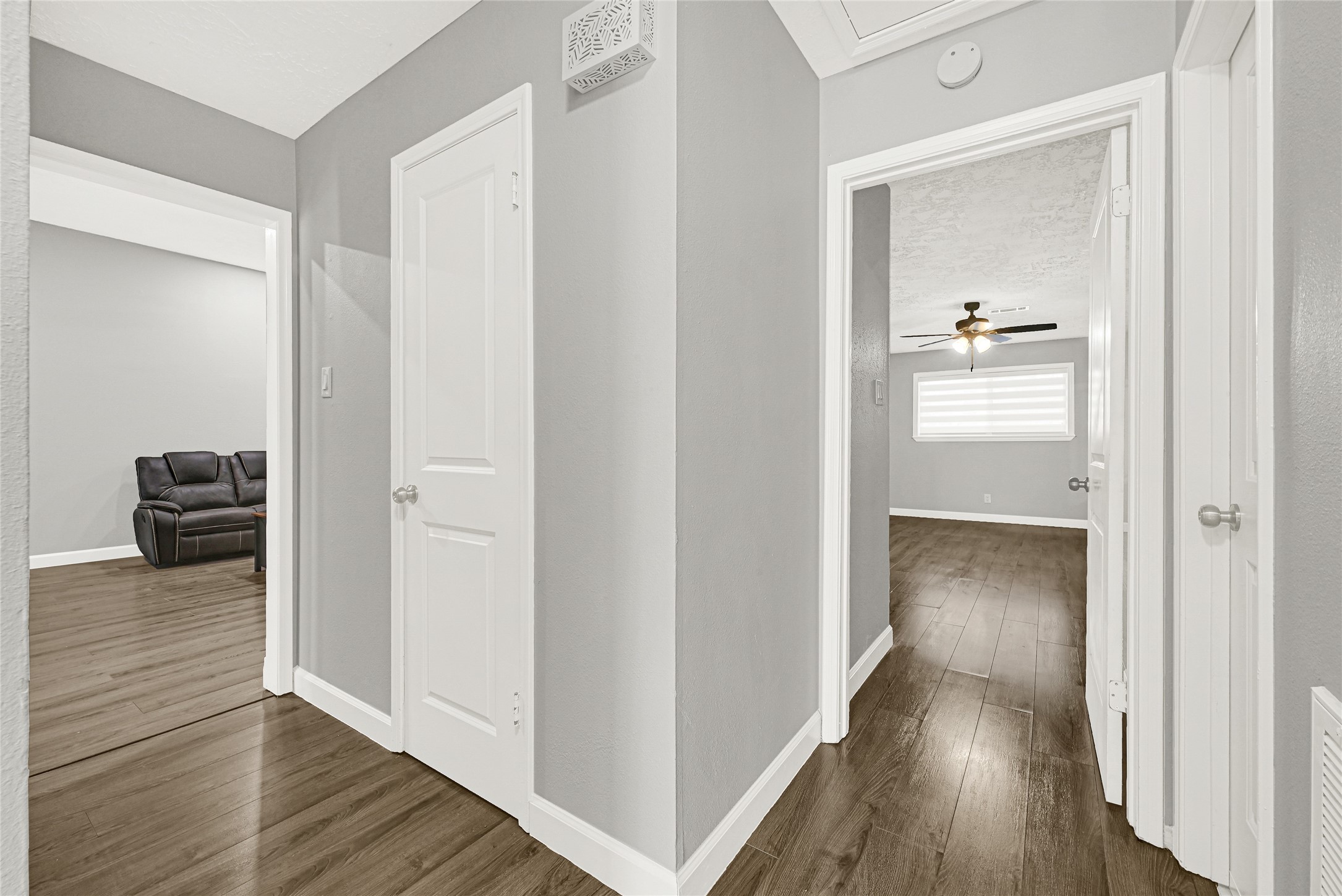 2407 Rambling Brook Drive Spring, TX 77373 - Photo 38 of 49 a view of a hallway with wooden floor and a bathroom