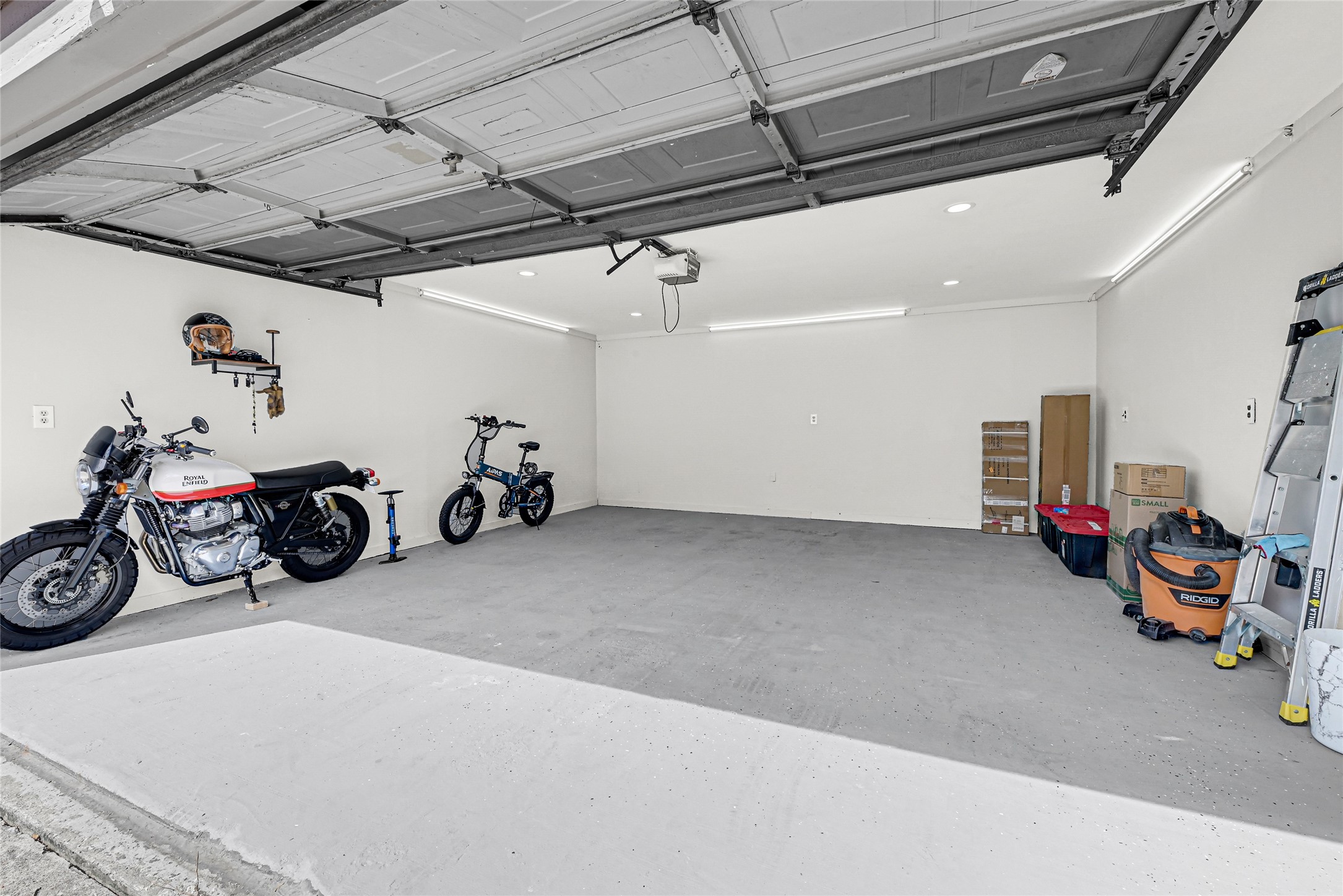 2407 Rambling Brook Drive Spring, TX 77373 - Photo 43 of 49 a view of a garage with parked cars