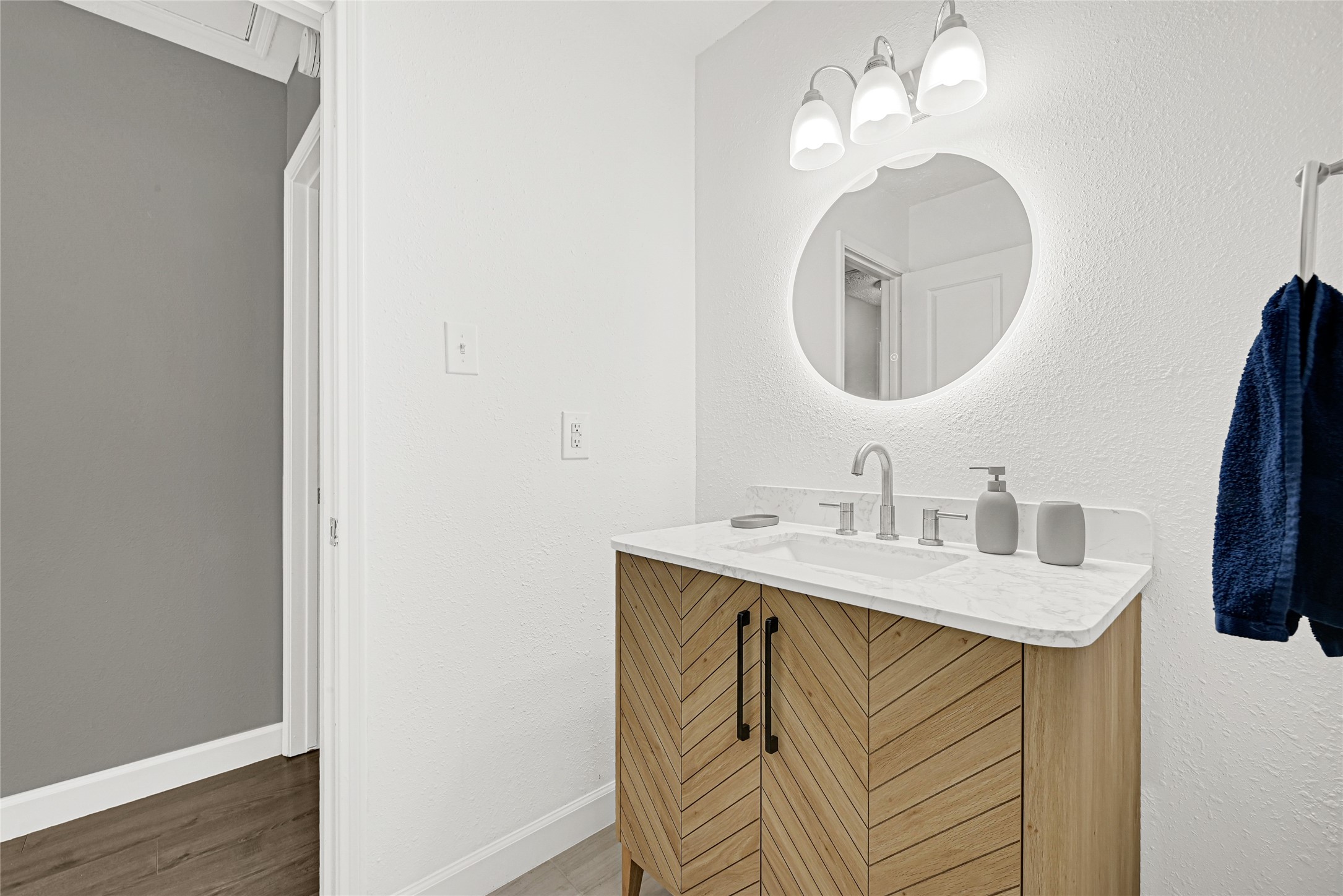 2407 Rambling Brook Drive Spring, TX 77373 - Photo 10 of 49 a bathroom with a sink and a mirror