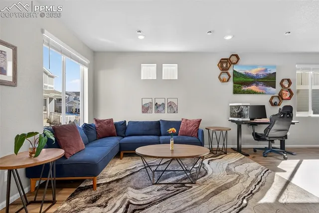 a living room with furniture and a couch
