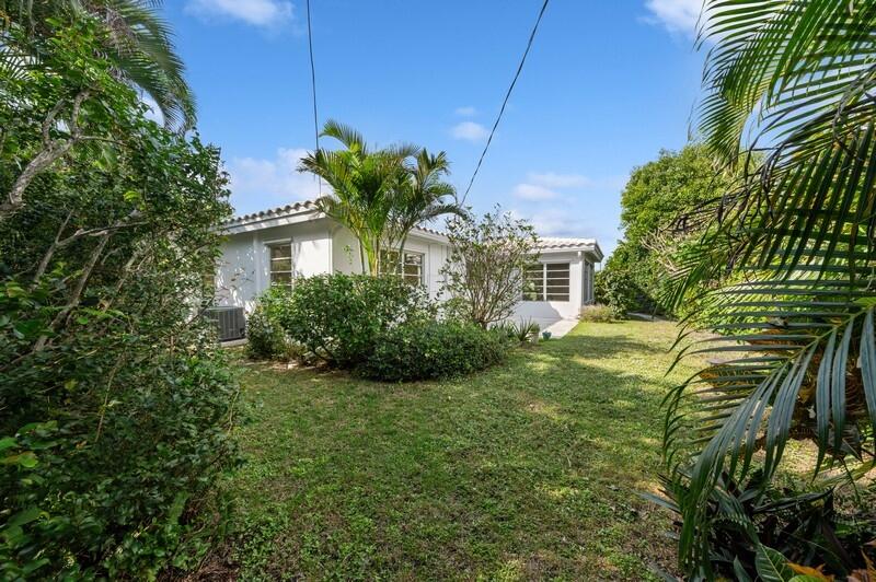 490 Northeast 5th Circle Boca Raton, FL 33431 - Photo 15 of 17 15_490NE5thCir_59_RearView_FlexMLS800x60