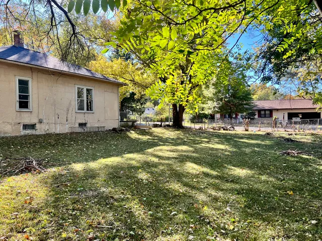 a view of a house with a tree