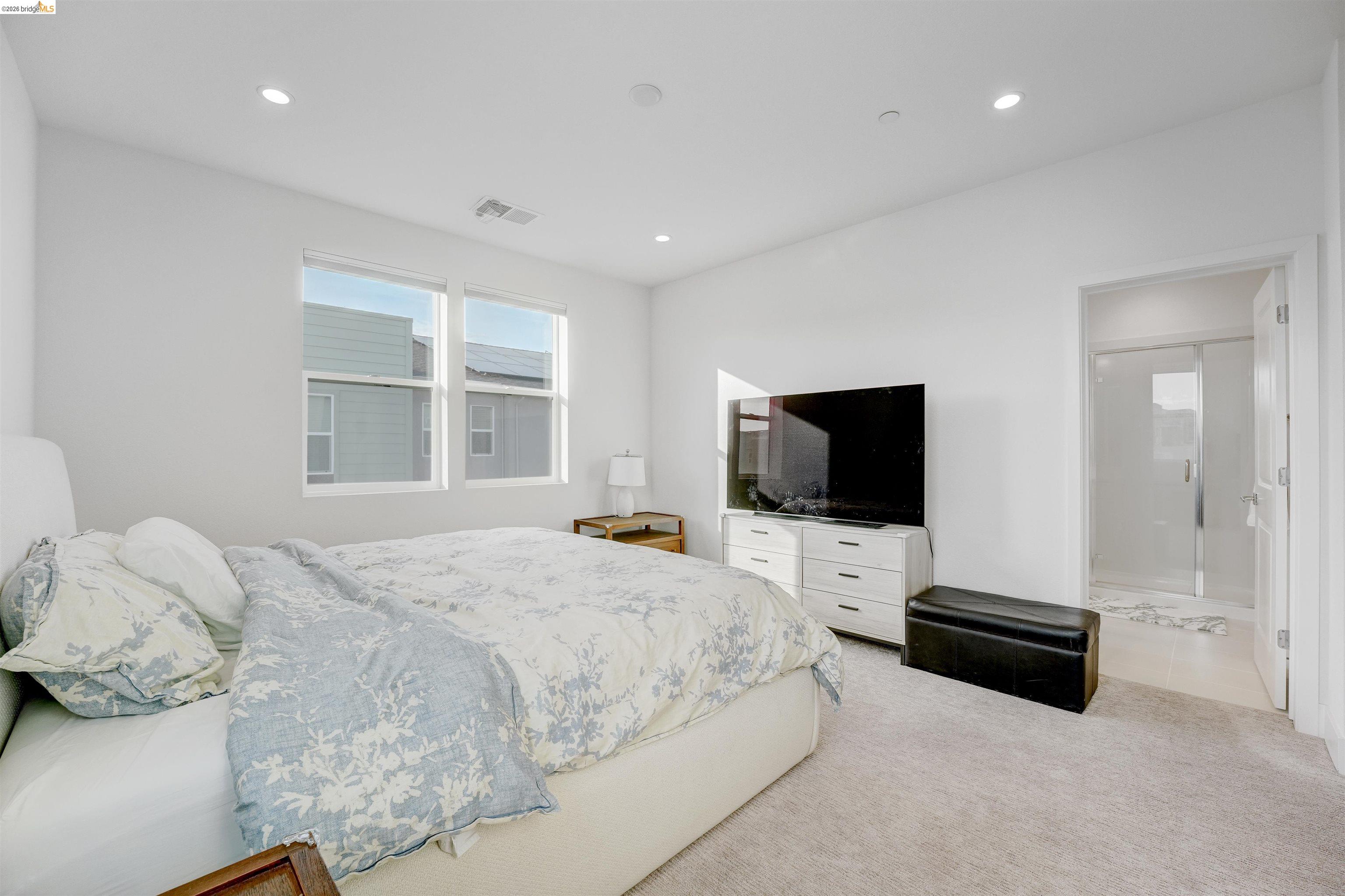 7101 Melon Court San Ramon, CA 94583 - Photo 43 of 58 a bedroom with a bed and a television