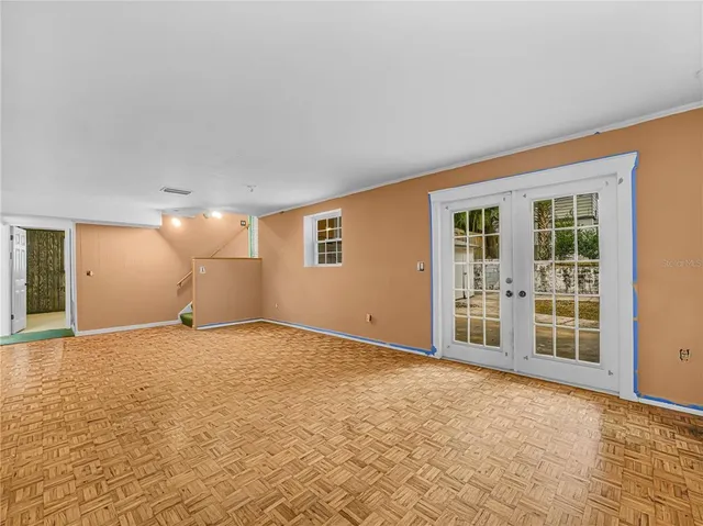 a view of an empty room with a window