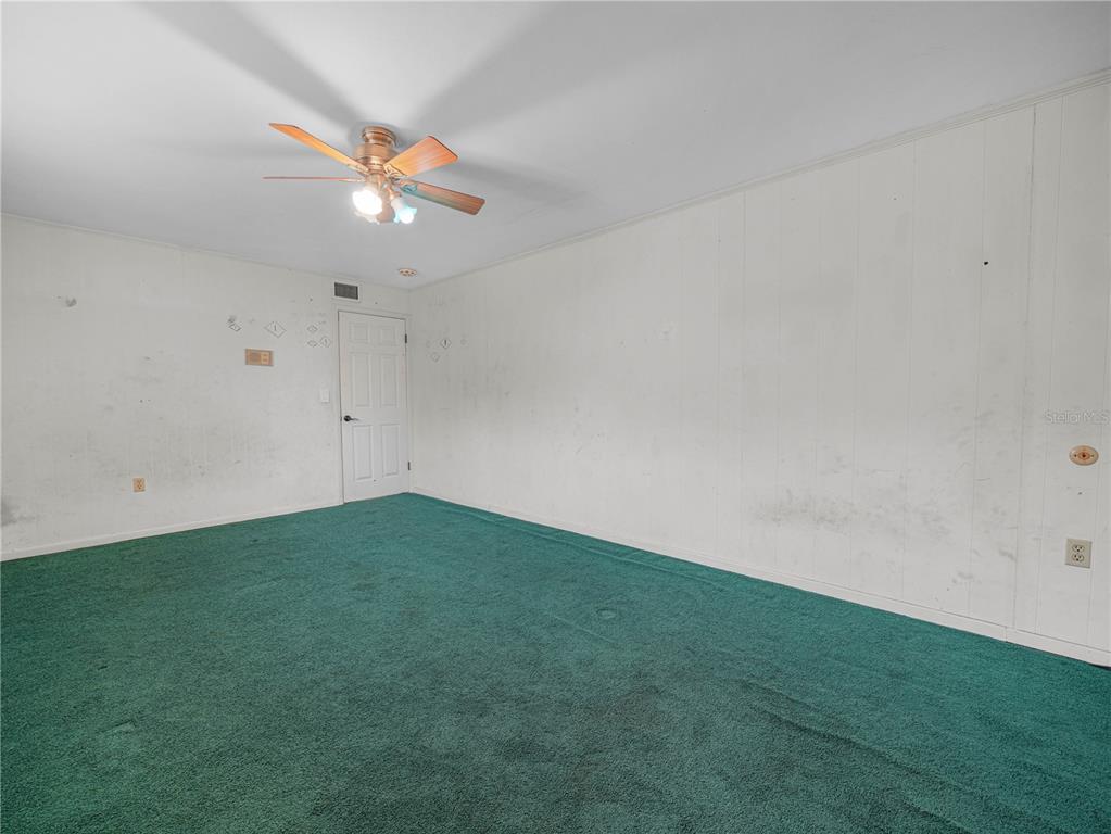 129 Lake Otis Road Winter Haven, FL 33884 - Photo 12 of 35 a view of empty room with window