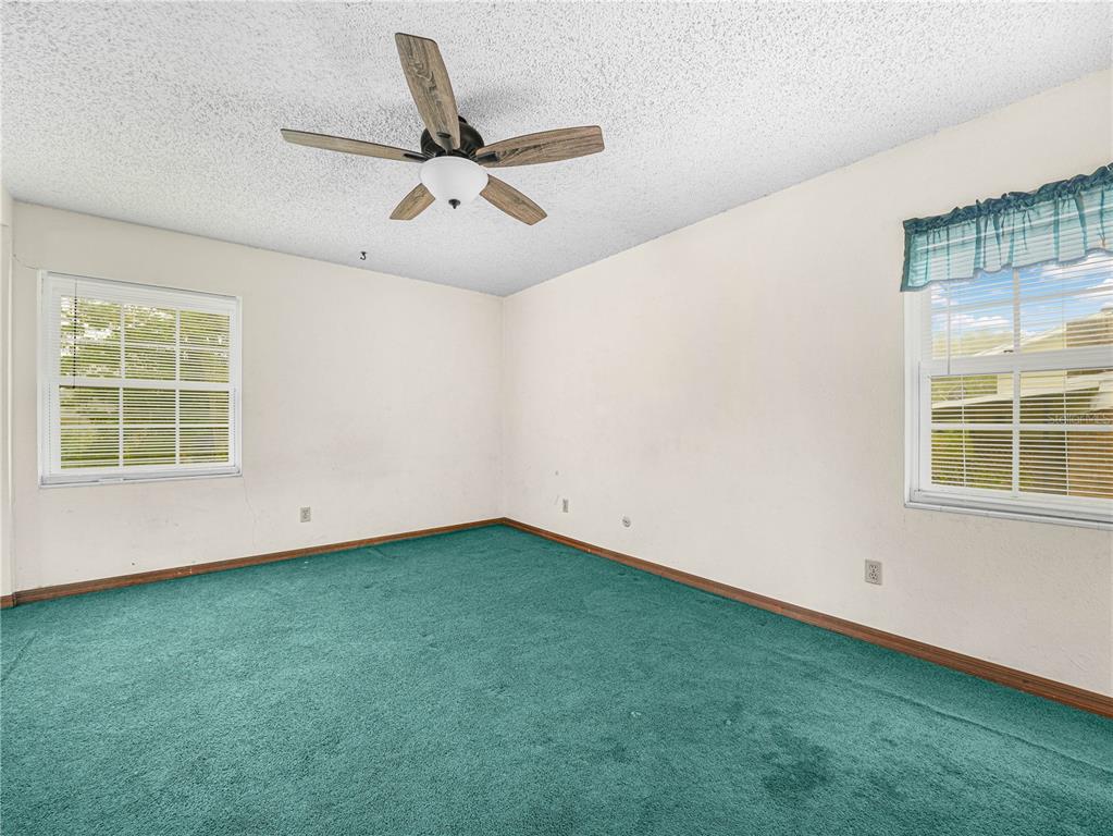 129 Lake Otis Road Winter Haven, FL 33884 - Photo 14 of 35 a view of an empty room with a window