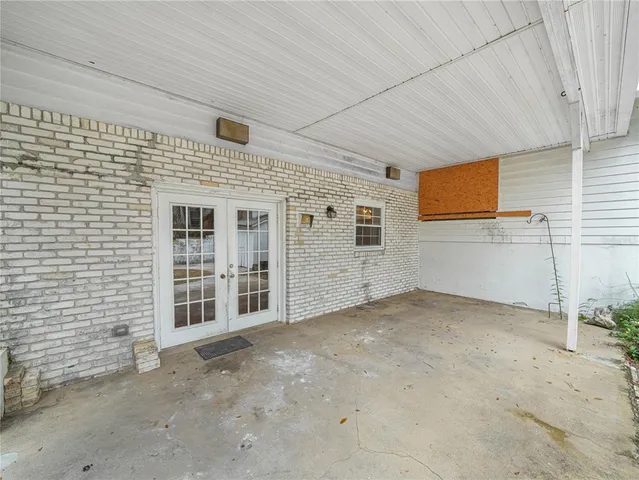 a view of a backyard with porch