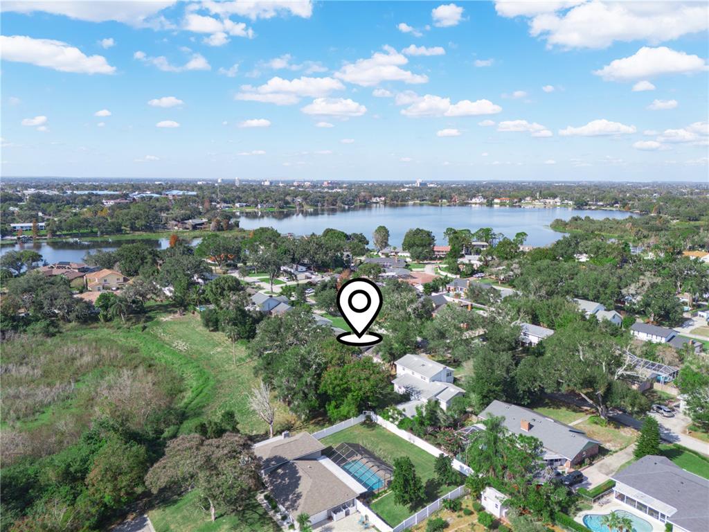 129 Lake Otis Road Winter Haven, FL 33884 - Photo 34 of 35 an aerial view of a city