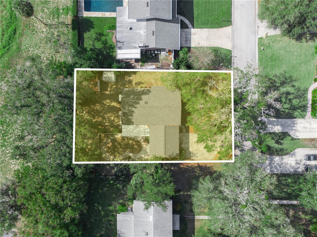 129 Lake Otis Road Winter Haven, FL 33884 - Photo 35 of 35 an aerial view of residential house with outdoor space and trees all around