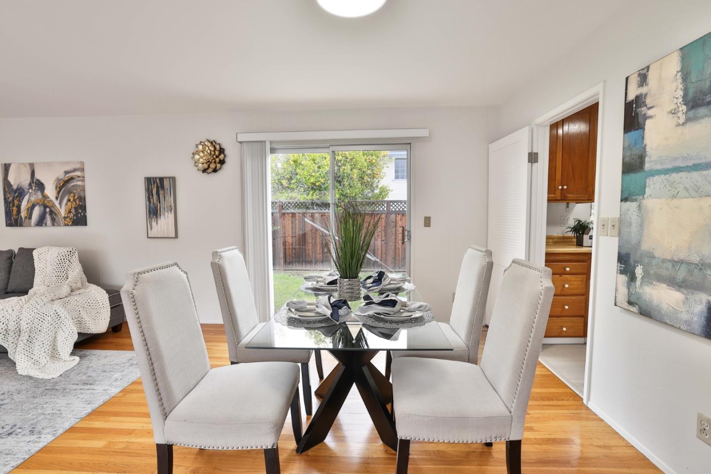 10326 Cherry Tree Lane Cupertino, CA 95014 - Photo 14 of 32 a dining room with furniture and window