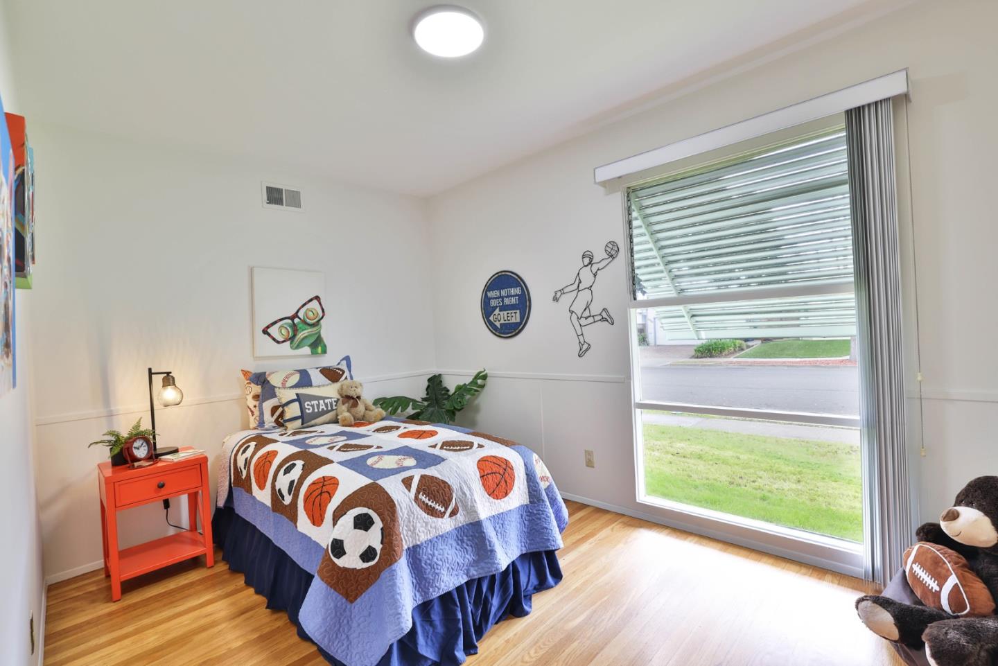 10326 Cherry Tree Lane Cupertino, CA 95014 - Photo 20 of 32 a bedroom with a bed and a window