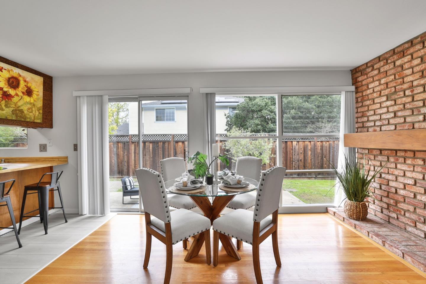10326 Cherry Tree Lane Cupertino, CA 95014 - Photo 5 of 32 a view of a dining room with furniture window and wooden floor