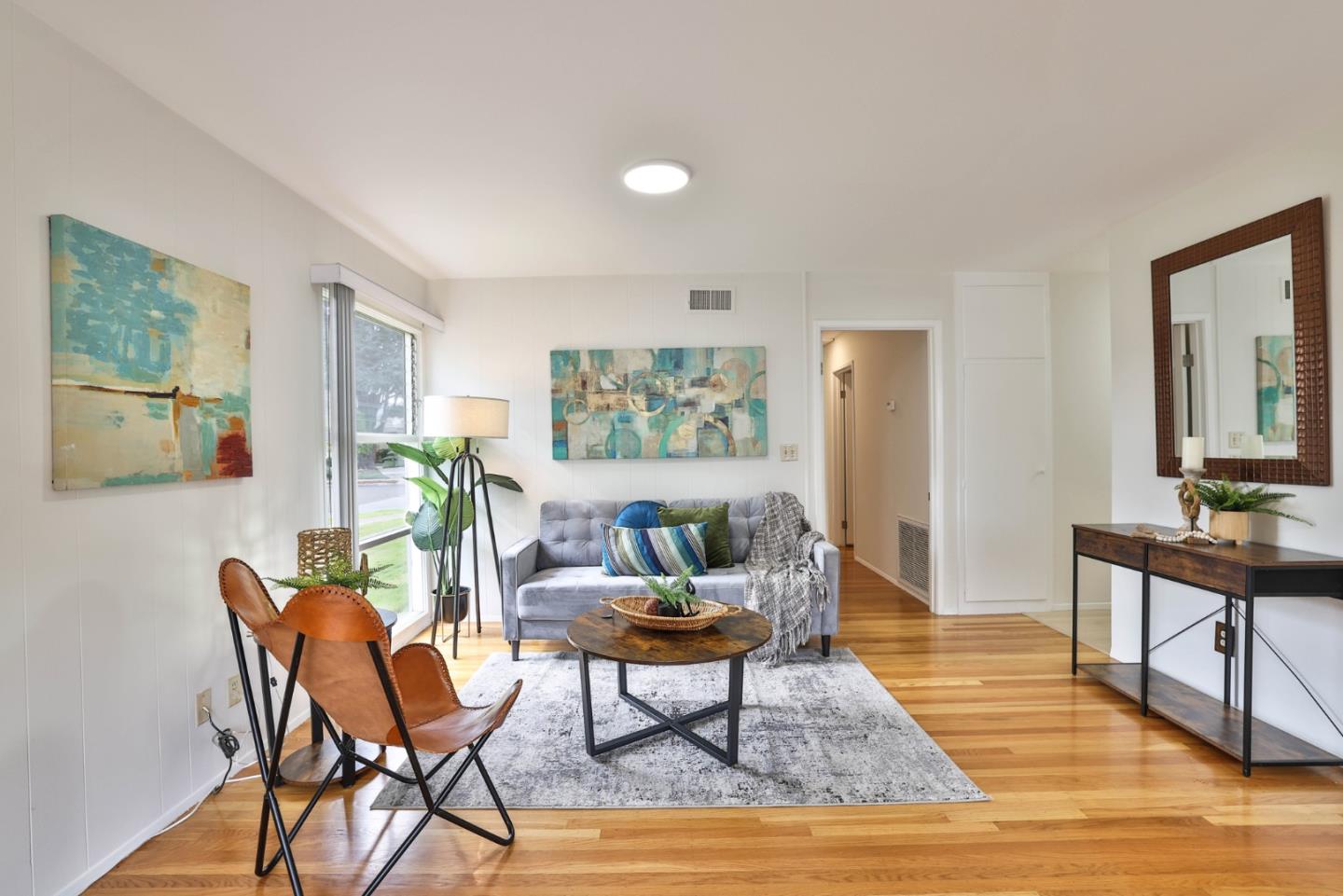 10326 Cherry Tree Lane Cupertino, CA 95014 - Photo 8 of 32 a living room with furniture and wooden floor