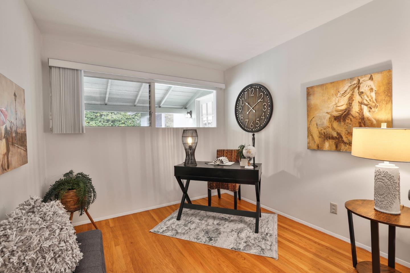 10326 Cherry Tree Lane Cupertino, CA 95014 - Photo 10 of 32 a living room with furniture a table and a window