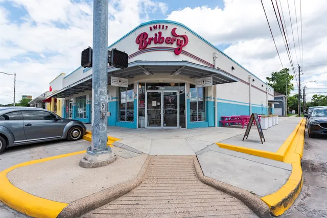 a front view of a building with balcony