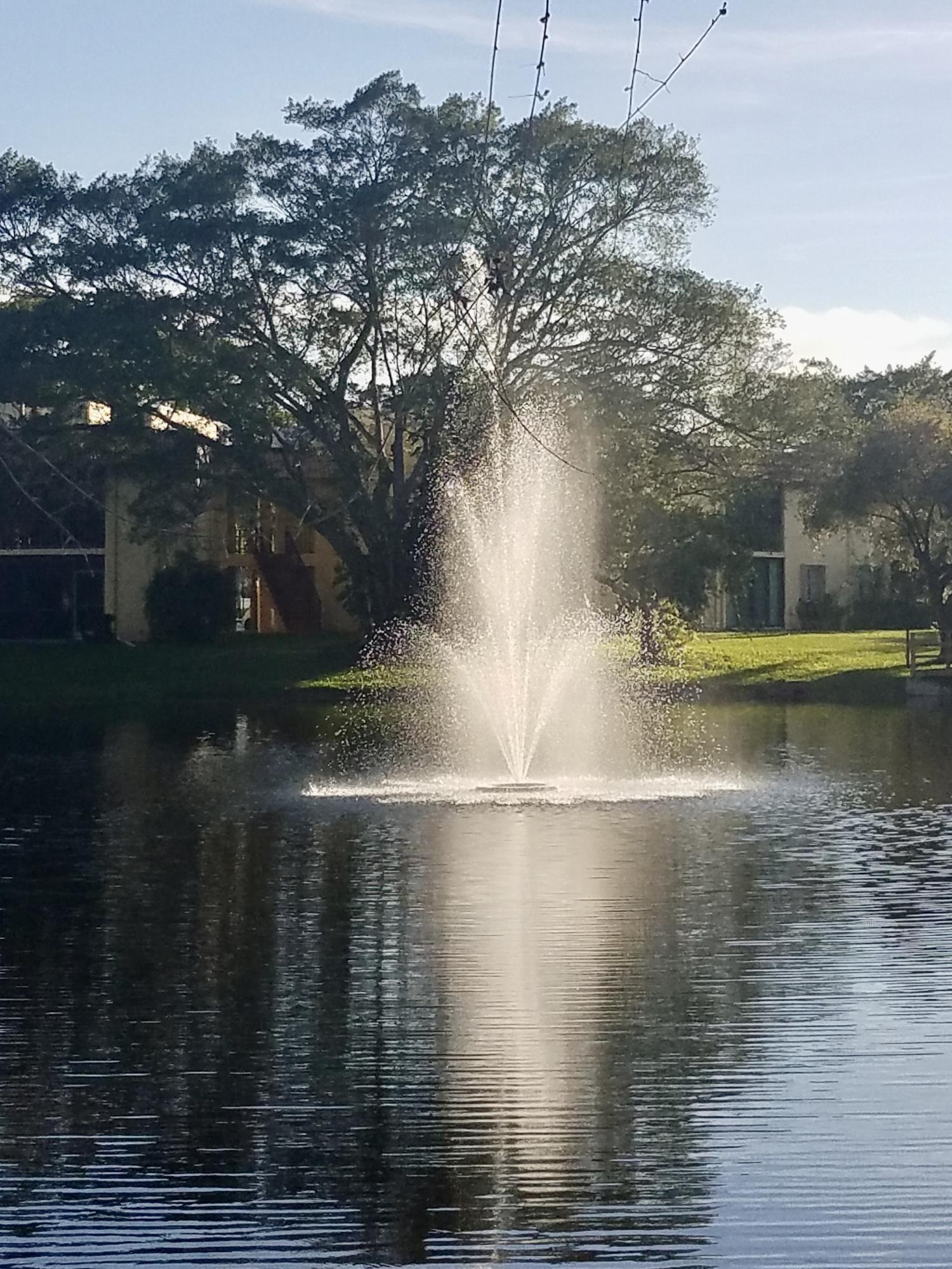 860 Southwest 9th St Circle, Unit 201 Boca Raton, FL 33486 - Photo 2 of 14 37CCF3D7-4819-4D57-9BCB-2C8189164222_1_2