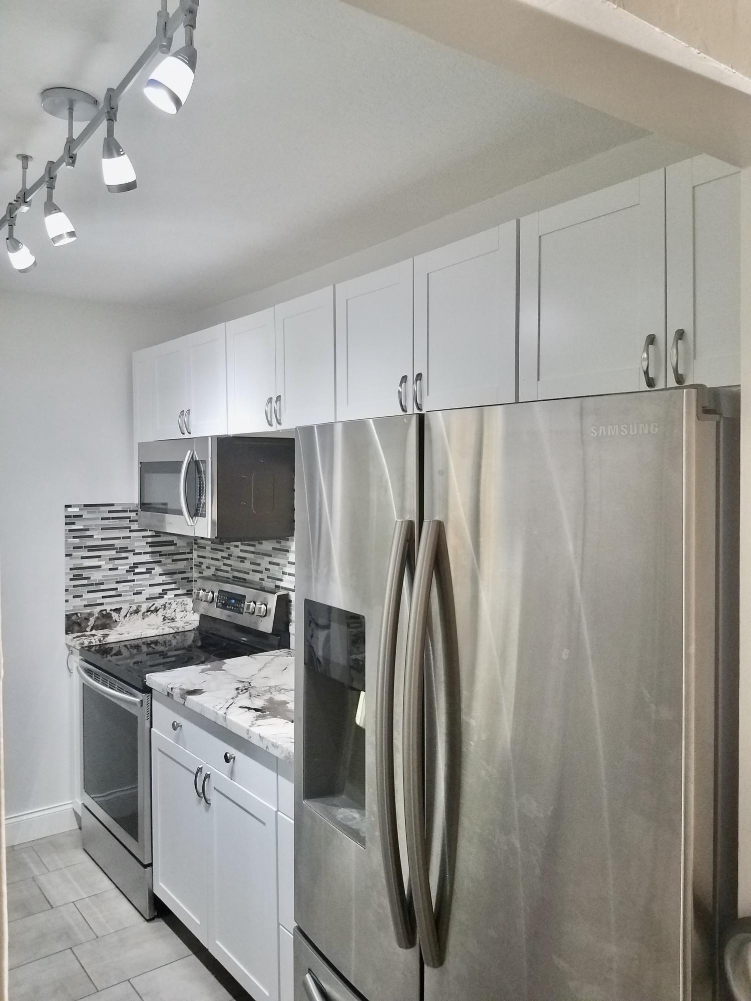 860 Southwest 9th St Circle, Unit 201 Boca Raton, FL 33486 - Photo 3 of 14 9AB628AE-B5BF-45C9-ABF7-24A91878D626_1_2