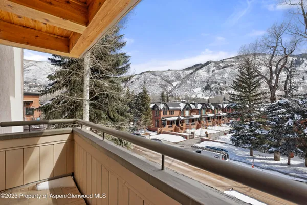 a view of a balcony with an outdoor space