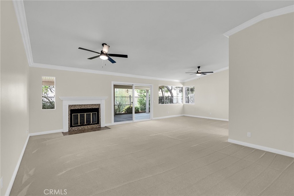 510 Vía Zapata Riverside, CA 92507 - Photo 20 of 47 a view of work space with chandelier fan and windows
