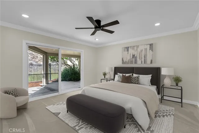 a bedroom with a bed and glass window
