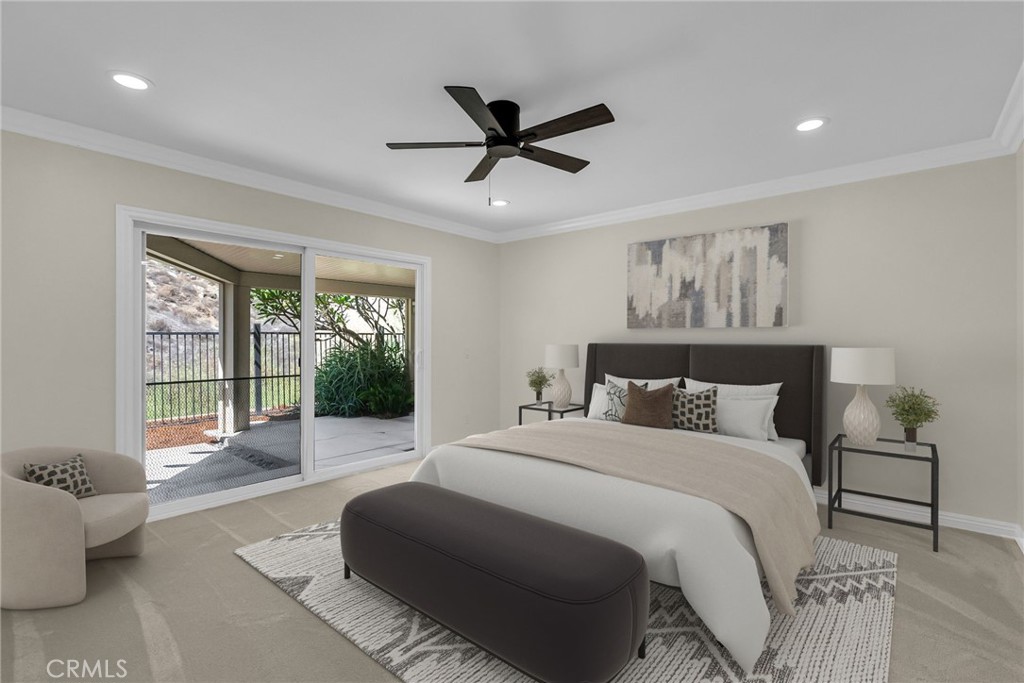 510 Vía Zapata Riverside, CA 92507 - Photo 9 of 47 a bedroom with a bed and glass window